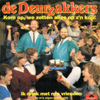 Deurzakkers - Kom Op We Zetten Alles Op Z'n Kop